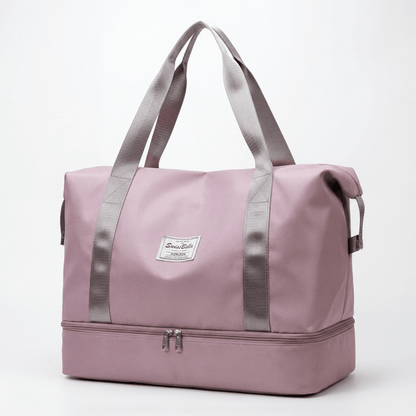 Hochwertige Studioaufnahme des SwissBella Horizon Weekenders in der Farbe Cashmere Rose auf weissem Hintergrund.
